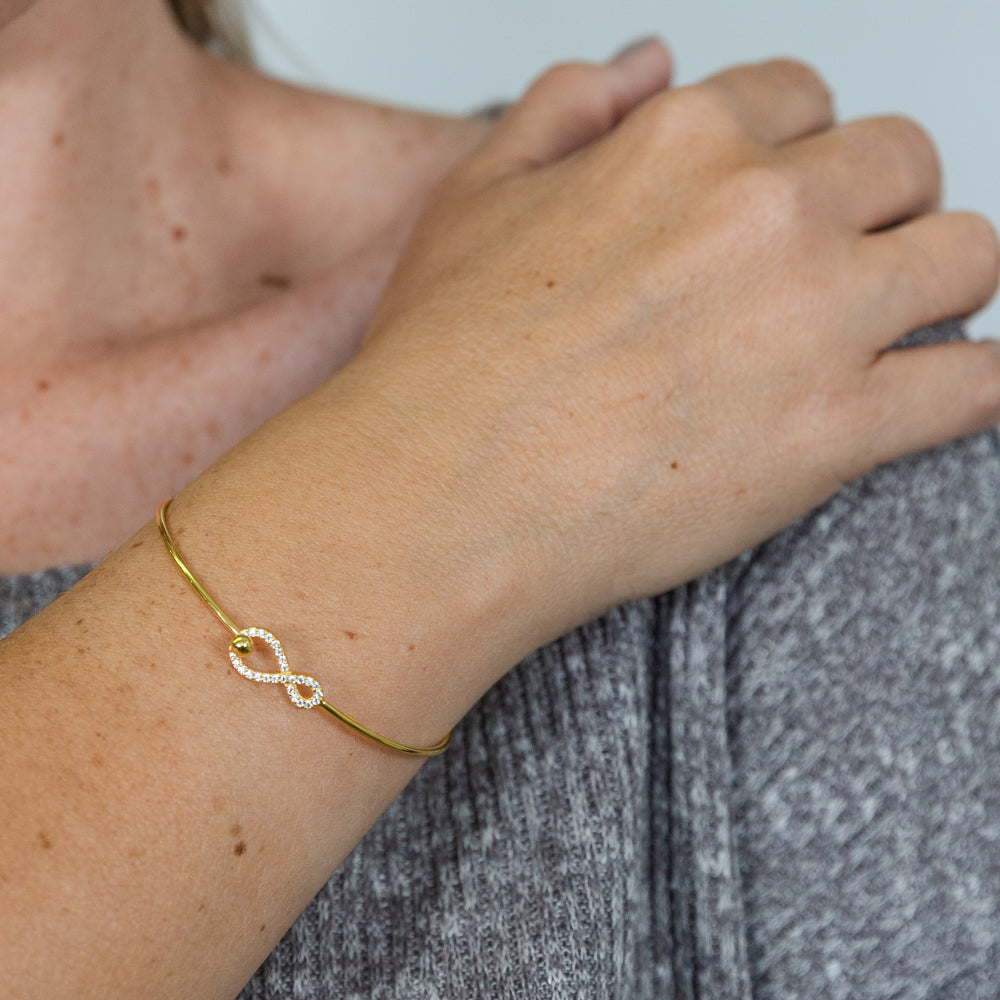 Gold shop infinity bangle